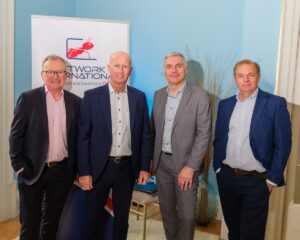 4 speakers at sign